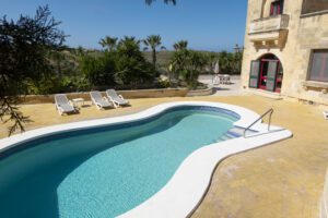 Large Outdoor Pool at Nirvana Holiday Home in Gozo